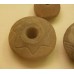 Clay figure, sun symbol, six-pointed